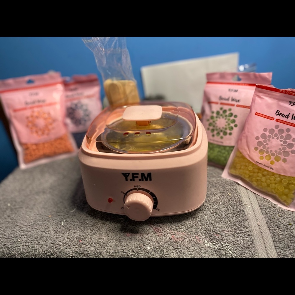 Pink Y.F.M Wax machine